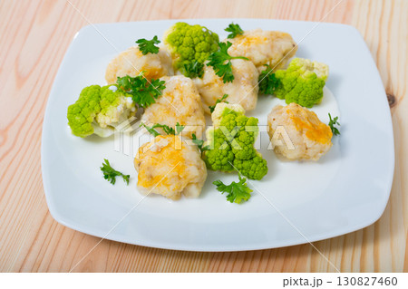Fish balls of different white fish at plate with brokkoli, dish of Norwegian cuisine 130827460