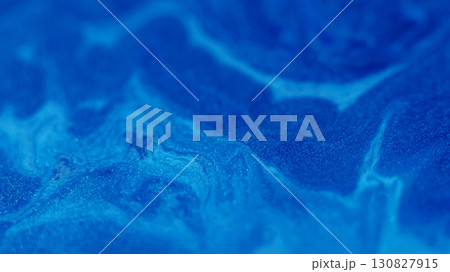 Shimmer mix. Acrylic enamel. Defocused blue color marble paint water fluid texture floating on abstract art wet creative background. 130827915