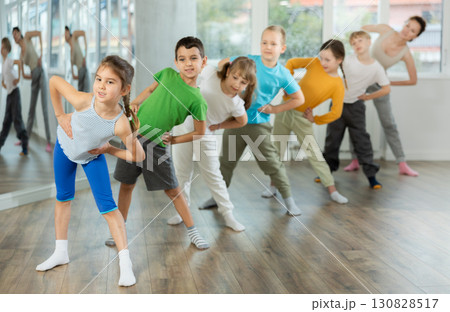Group of children warming up before dance class 130828517