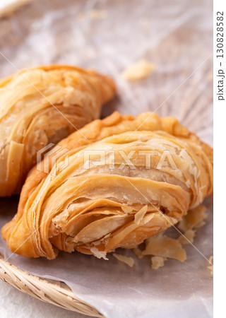 Curry puff stuffed with chicken or sweet potatoes, Thai snack food style 130828582