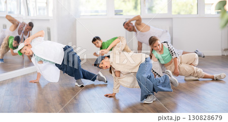 Group of children dancers having break dance training at dance studio 130828679
