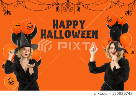 Two women dressed in costumes celebrate Halloween with balloons 130829748