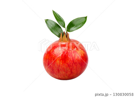 Glossy red pomegranate with green leaves, isolated, PNG 130830058