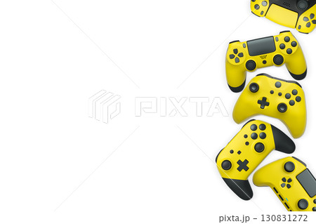Wireless gaming controllers flying in air isolated on white background with clipping path, symbolizing gaming technology concept. Wireless gaming controllers flying in air isolated on white background with clipping path, symbolizing gaming technology concept. 130831272