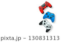 Wireless gaming controllers flying in air isolated on white background with clipping path, symbolizing gaming technology concept. 130831313
