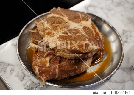 Fresh Marinated Pork on Plate, Ready for Cooking 130832366