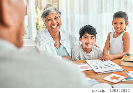Education, learning and grandmother bonding with grandchildren helping them with fun activities. Home school, smile and elderly woman spending time and sitting with kids outdoor of family home. 130832936