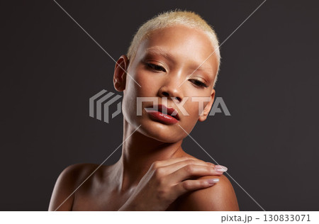 Beauty, makeup and cosmetics, face of black woman in dark studio with platinum hair isolated on grey background. Art aesthetic, skincare and beautiful African model in skin glow and luxury spa facial Beauty, makeup and cosmetics, face of black woman in dark studio with platinum hair isolated on grey background. Art aesthetic, skincare and beautiful African model in skin glow and luxury spa facial 130833071