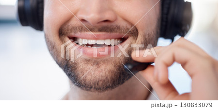 Man at call center, smile closeup and contact us with customer service employee, face and CRM with consultant. Professional, communication, mouth with headset and mic, help desk and telemarketing Man at call center, smile closeup and contact us with customer service employee, face and CRM with consultant. Professional, communication, mouth with headset and mic, help desk and telemarketing 130833079