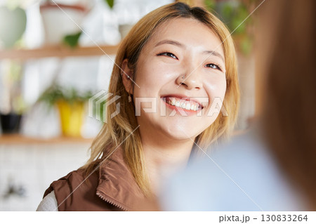 Face, happy or smile and an asian woman in a coffee shop, enjoying spending time with a friend. Cafe, brunch and lifestyle with an attractive young girl sitting in a restaurant for a chat or catch up Face, happy or smile and an asian woman in a coffee shop, enjoying spending time with a friend. Cafe, brunch and lifestyle with an attractive young girl sitting in a restaurant for a chat or catch up 130833264