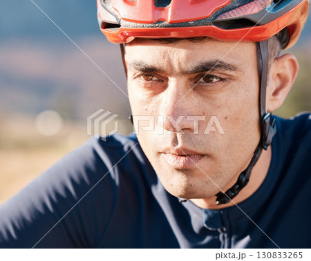 Serious, cycling and face of man in nature for training, fitness and cardio. Focus, vision and professional biker in the countryside for a marathon, race or triathlon for sports, exercise and riding Serious, cycling and face of man in nature for training, fitness and cardio. Focus, vision and professional biker in the countryside for a marathon, race or triathlon for sports, exercise and riding 130833265