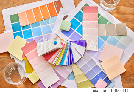 Color palette paper on table for background in design choice, branding and creativity career, project or planning. Colorful charts, sticky note and print paper for creative or brand development above 130833312