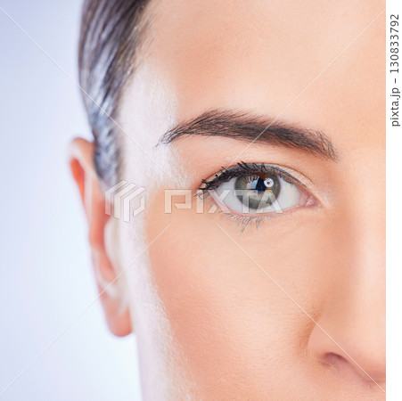 Closeup, portrait and woman with skincare, cosmetics and dermatology against a studio background. Face, female and lady with grooming, zoom and treatment with natural care, eye and morning routine Closeup, portrait and woman with skincare, cosmetics and dermatology against a studio background. Face, female and lady with grooming, zoom and treatment with natural care, eye and morning routine 130833792