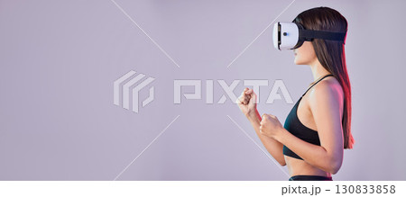 Vr, fitness metaverse and woman in studio isolated on a purple background mockup. 3d gamer, virtual reality and female athlete with futuristic headset for gaming, fighting and fantasy simulation. Vr, fitness metaverse and woman in studio isolated on a purple background mockup. 3d gamer, virtual reality and female athlete with futuristic headset for gaming, fighting and fantasy simulation. 130833858