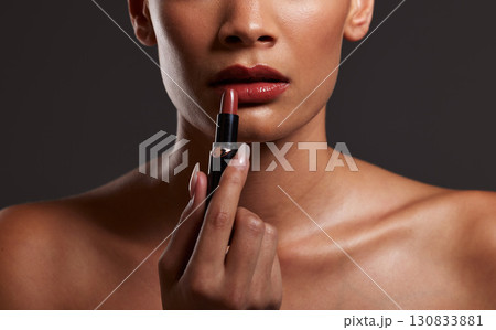 Makeup, lips and hands of woman with lipstick in studio for cosmetics and skincare products. Salon aesthetic, cosmetology and girl model with red gloss for beauty, mouth and luxury style Makeup, lips and hands of woman with lipstick in studio for cosmetics and skincare products. Salon aesthetic, cosmetology and girl model with red gloss for beauty, mouth and luxury style 130833881