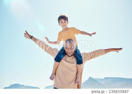 Family, beach and father with boy on shoulder by ocean for bonding, quality time and relaxing on weekend. Travel, smile and happy dad holding child on summer holiday, vacation and adventure together Family, beach and father with boy on shoulder by ocean for bonding, quality time and relaxing on weekend. Travel, smile and happy dad holding child on summer holiday, vacation and adventure together 130833887