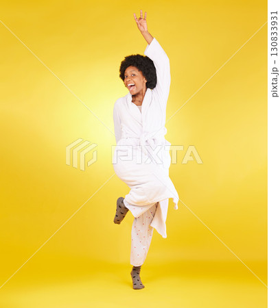Portrait, excited and black woman with pajamas, happiness and girl on studio background. Face, African American female and happy lady with smile, morning joy and glory with energy, silly and goofy 130833931