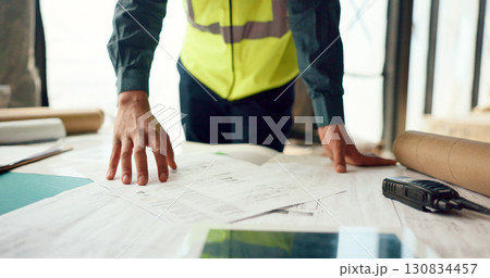 Hands, blueprint and architect at construction site, engineering and urban infrastructure with contractor person. Floor plan, paperwork and illustration with renovation and property development Hands, blueprint and architect at construction site, engineering and urban infrastructure with contractor person. Floor plan, paperwork and illustration with renovation and property development 130834457