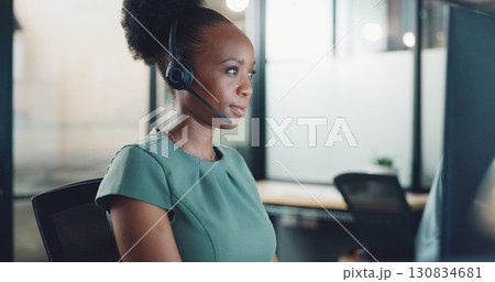 Business woman, computer and call center for night communication, customer support and online chat. Advisor, consultant or African person with advice, FAQ update and website management in office Business woman, computer and call center for night communication, customer support and online chat. Advisor, consultant or African person with advice, FAQ update and website management in office 130834681