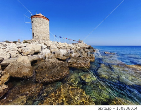 Rhodes windmills. Beautiful concept for travel and vacation in Greece. Rhodes windmills. Beautiful concept for travel and vacation in Greece. 130836014