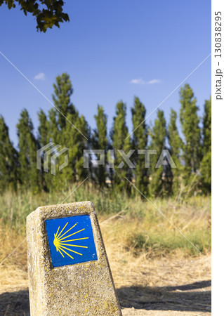 Camino de santiago milestone showing the way to pilgrims in Navarre, Spain Camino de santiago milestone showing the way to pilgrims in Navarre, Spain 130838295