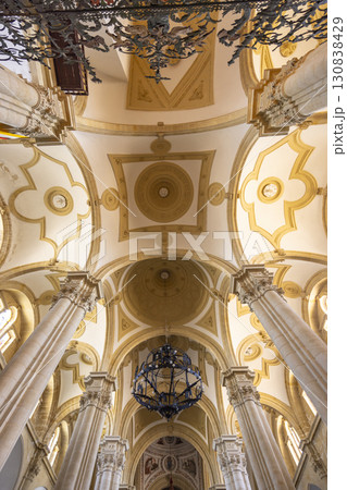 Baeza Cathedral Ceiling Showing Intricate Architectural Details and Chandelier Baeza Cathedral Ceiling Showing Intricate Architectural Details and Chandelier 130838429