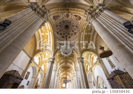 Baeza Cathedral interior showing columns, dome, and chandeliers in Andalusia, Spain Baeza Cathedral interior showing columns, dome, and chandeliers in Andalusia, Spain 130838430
