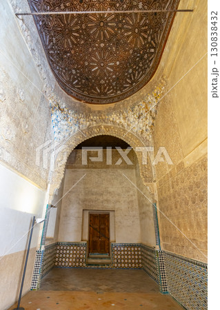 Intricate Ceiling and Ornate Arch in Alhambra Palace, Granada, Spain 130838432