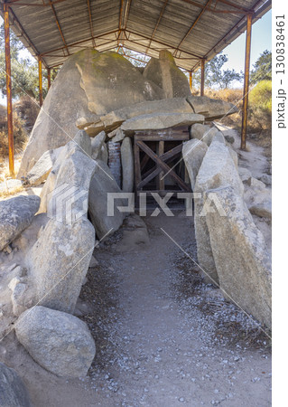 Anta Grande do Zambujeiro dolmen under protective cover in Evora, Portugal 130838461