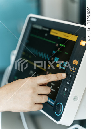 Hand Operating Medical Monitor in clinic hospital 130840904