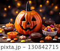 ハロウィンのかぼちゃとお菓子 130842715