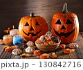 ハロウィンのかぼちゃとお菓子 130842716
