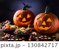 ハロウィンのかぼちゃとお菓子 130842717