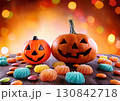 ハロウィンのかぼちゃとお菓子 130842718
