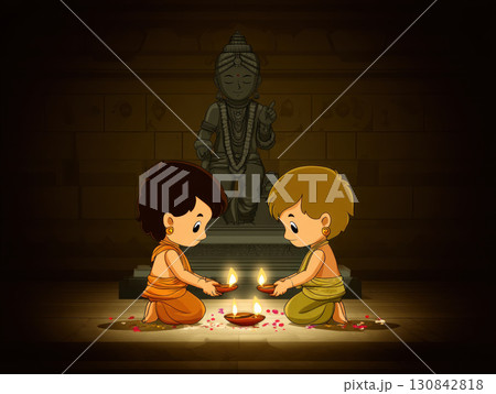 Two children in traditional attire holding oil lamps and praying in front of statue, creating warm and peaceful atmosphere 130842818