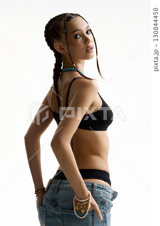 beautiful girl with braids and accessories. 130844450
