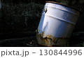 White steel barrel damaged by rust 130844996