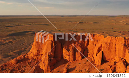 Bayanzag flaming cliffs at sunset in Mongolia Bayanzag flaming cliffs at sunset in Mongolia 130845821