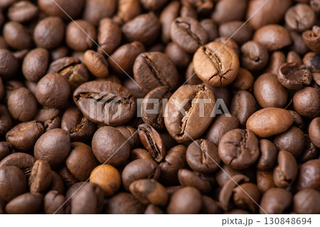Close up of roasted coffee beans. Aromatic dark coffee beans 130848694