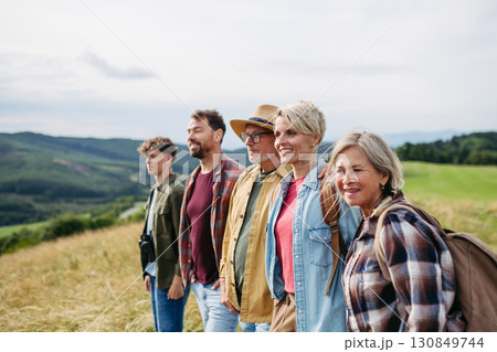 Multigenerational family on hiking trip in nature. Multigenerational family on hiking trip in nature. 130849744