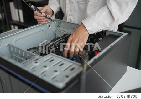 Computer Hardware dissemblers fixing computer PC. Computer Hardware dissemblers fixing computer PC. 130849809