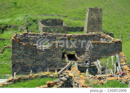 Stone ruins of residential buildings in the mountain village of Galiat in North Ossetia 130851006