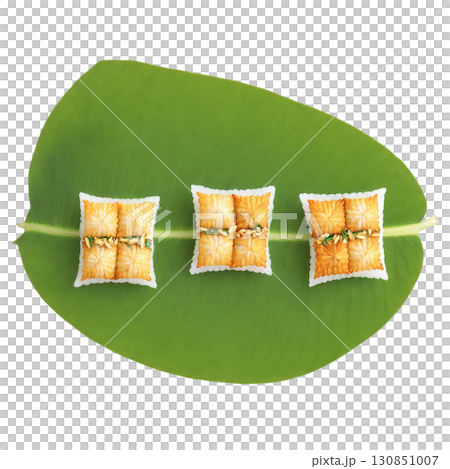 Miang Pla - A traditional Thai snack made with grilled fish, fresh herbs, and crispy rice crackers, wrapped 130851007