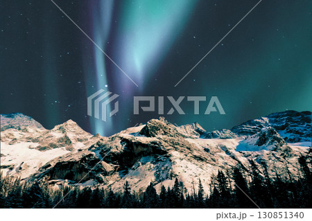 night view of snowy mountain range and milky way. starry night sky with stars and moon. beautiful landscape with snowy mountain peaks in winter night. night view of snowy mountain range and milky way. starry night sky with stars and moon. beautiful landscape with snowy mountain peaks in winter night. 130851340