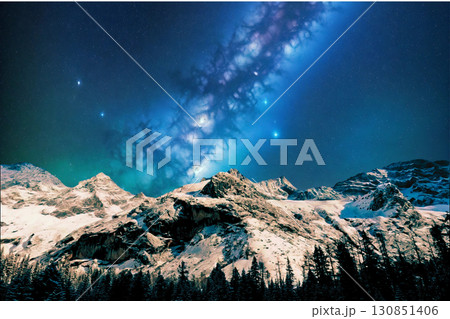 night view of snowy mountain range and milky way. starry night sky with stars and moon. beautiful landscape with snowy mountain peaks in winter night. 130851406