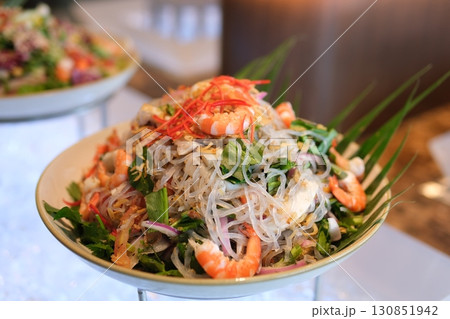 Shrimp salad with fresh mango noodles and vegetables  130851942