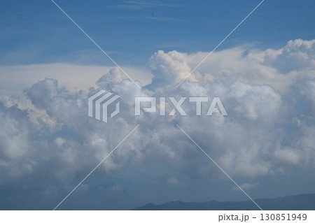 High nature view large white clouds on soft sky background in the morning, View of white cloudy on the plane. 130851949