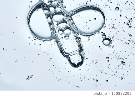 The texture of a serum or cosmetic gel with a dropper. 130852295