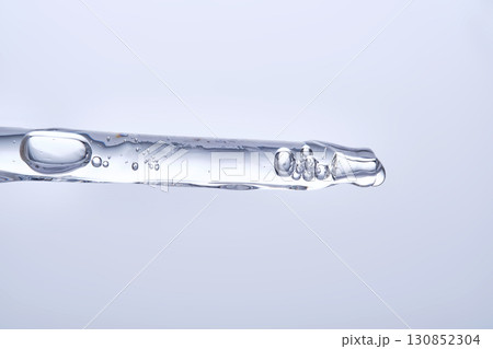 Soothing serum with natural green tea extract in a pipette. Soothing serum with natural green tea extract in a pipette. 130852304