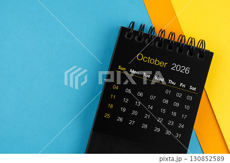 Black calendar for October 2026 on multi color background. 130852589